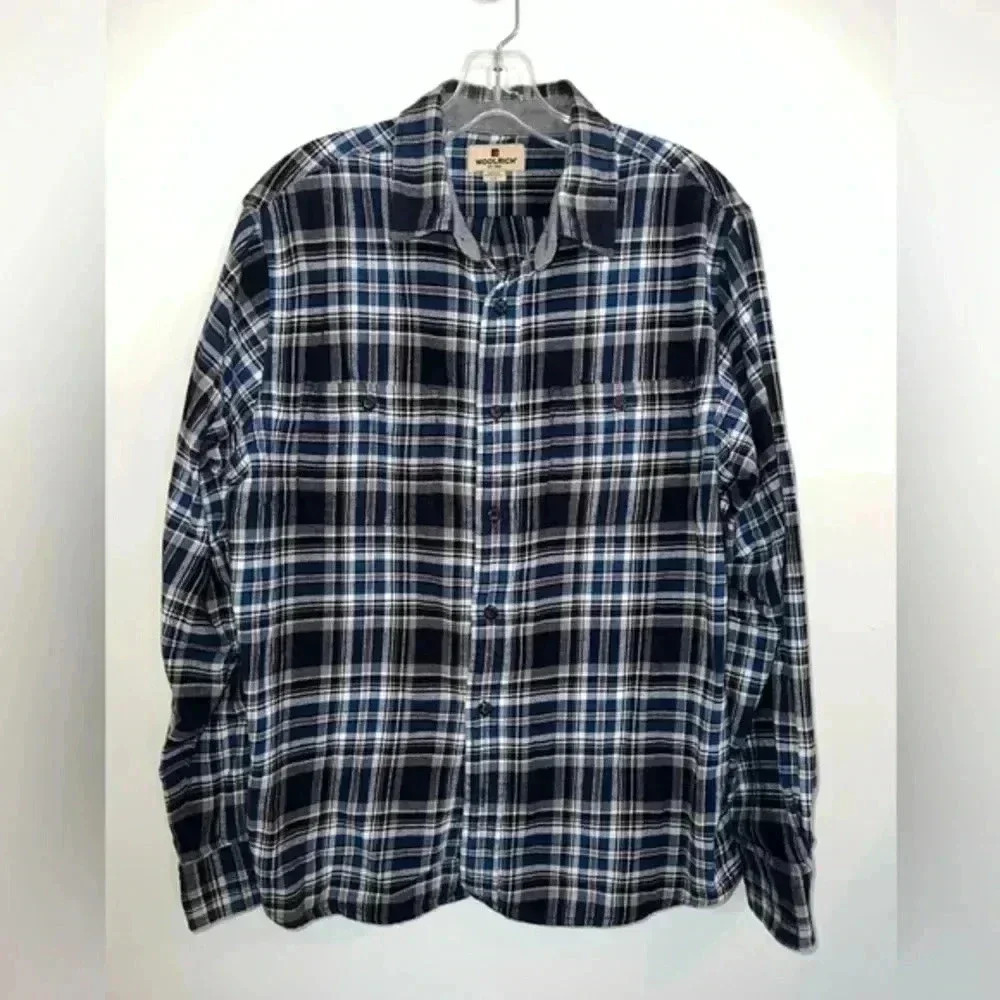 Vintage Woolrich Plaid Flannel‎ Shirt in classic blue, white, black, and gray.